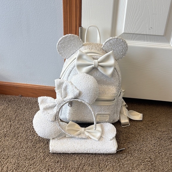 Loungefly sequence bag wallet and ears.